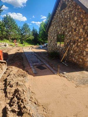 Paver side walk being built