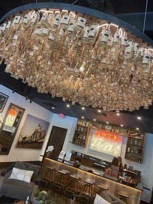 Soo dope! Tito's bottle chandelier!