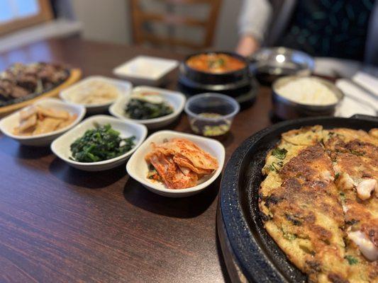 Seafood pancake and side dishes