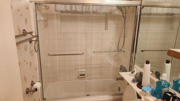 Clear shower doors in guest bathroom.