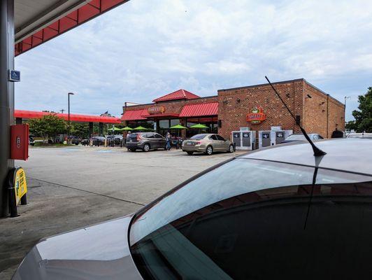 Outside the convenience store. Storefront. This is a big Sheetz with 18 pumps.