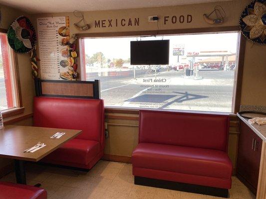 The Mexican food menu is on the left side of the wall. You also get it at the table.