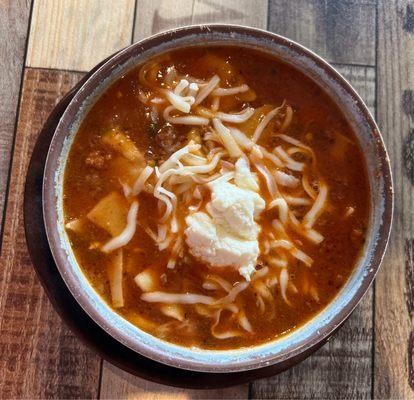 Lasagna soup with ricotta on top