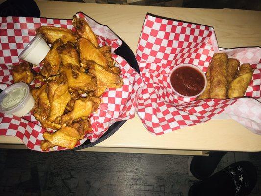 Wings and pizza logs