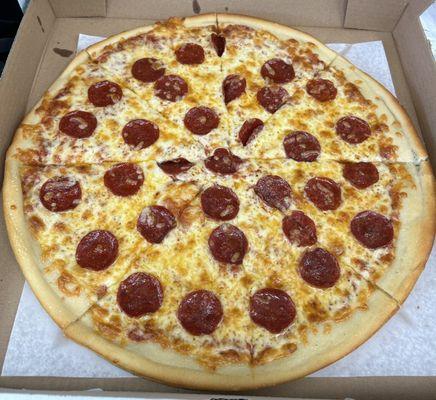 Pepperoni Pizza - thin deep dish style, buttery crust, greasy with not a lot of sauce. Not my style. Meh