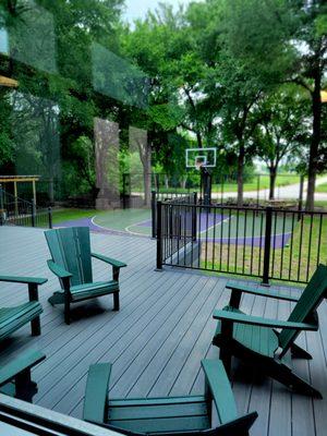 Beautiful outdoor sitting area. There is a small basketball court for shooting a few balls and a volleyball area. April 2024