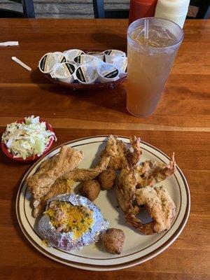 Fish and shrimp combo with loaded baker and slaw.