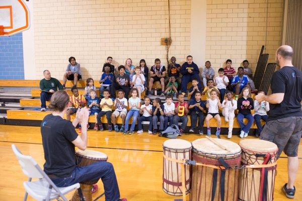 Students interact with an Urban Gateways Touring Performance at a local school.