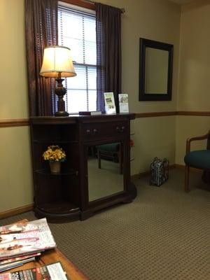 Nice, clean waiting area with lots of Magazines and a TV