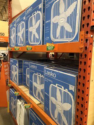 Numerous box fans on sale.