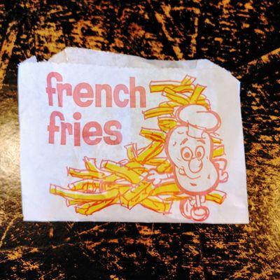 Potato chef is happy with a sense of uncertainty about the French fries on the sliced potato sack