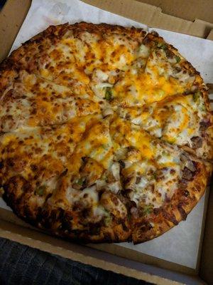 Half BBQ, half nightmare pizza