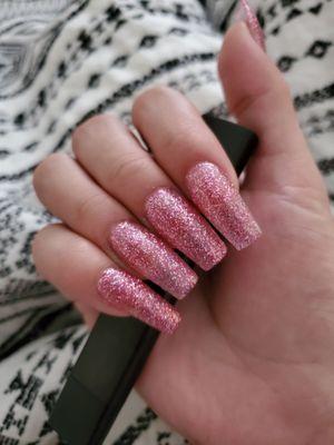 Perfectly shaped long pink glitter coffin nails