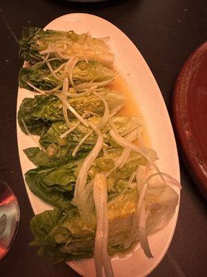 Lettuce with vinaigrette accompanied the crispy pork