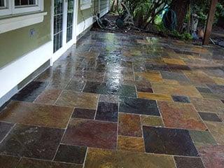 Wow!  There really was a slate patio under all that dirt that showed up after the pressure washing.