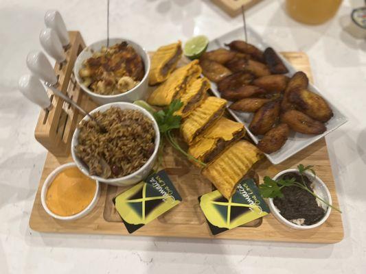 Beef patties, ja'mac and cheese, plaintains, and rice and peas!