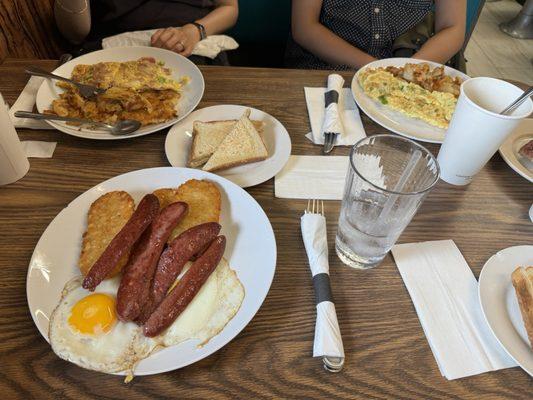 Delicious beef sausage and perfectly cooked eggs and hash browns.