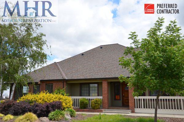 Installation of Owens Corning Duration shingle in color Teak.  New Gutters & downspouts throughout.