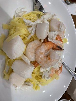 Seafood Fettuccine minus the sauce (my preference)