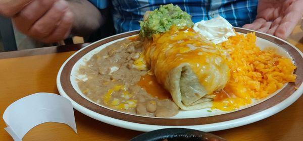 Hubby's carne asada burrito rice, beans $17.99