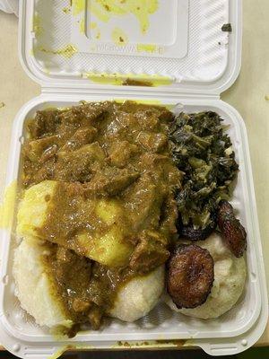 Curry goat, dumplings, half spinach and half plantains.