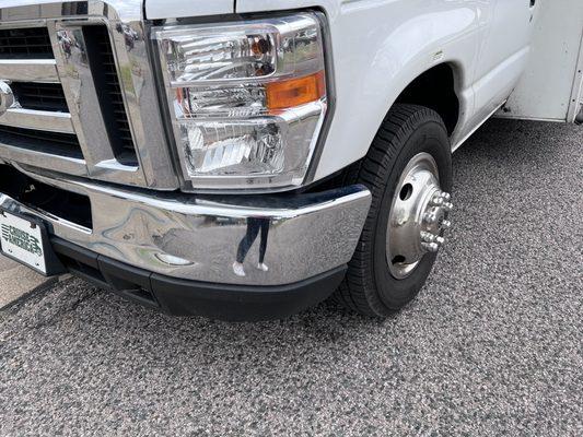 Broken bumper that had clearly been in an accident and never repaired