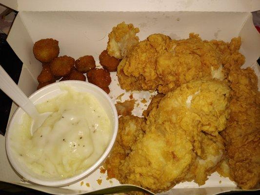 Huge, fresh and flavorful chicken strip dinner with mashed potatoes and fried okra!