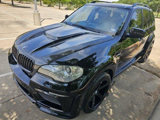 2013 BMW X5 35i with Hamann wide body kin installed.