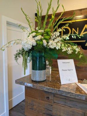 We love your work. When we ordered, we had no idea that the arrangement would be so original and beautiful. You exceeded our expectations!