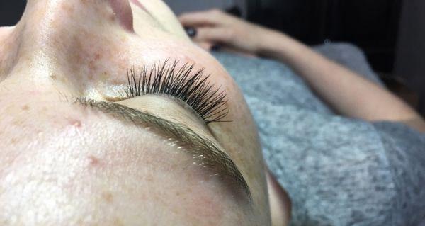 Eyelashes AFTER the eyelash extensions have been applied by the eyelash technician Ashley