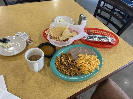 Breakfast chorizo and egg rice and beans and good warm salsa and homemade tortillas.