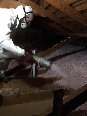 Installing new R-49 attic insulation. Never to late to winterize your home!