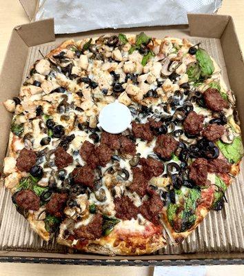 Medium 1/2 chicken 1/2 Impossible Meat, signature red sauce, mozzarella, spinach, mushrooms, black olives