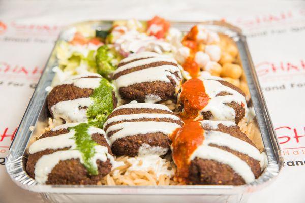 Falafel over rice with your choice of salad and sauces.