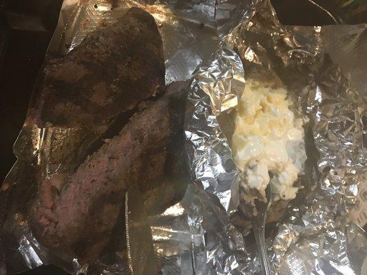 Medium sirloin and baked potato with butter and sour cream..perfect