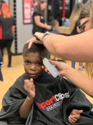 Ali cutting Ethan's hair!