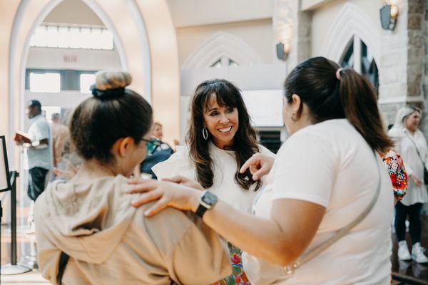 Pastor Sheila connecting with first time guests at the Connection Center