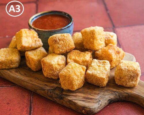 Golden, crispy deep-fried tofu--light, flavorful, and perfect with tangy sauces. A plant-based delight!