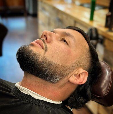 Clean modern mullet with beard trim!