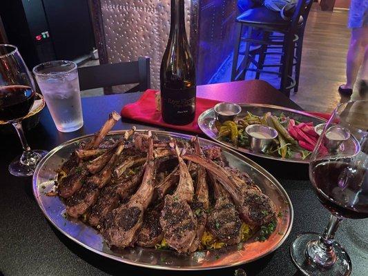 Seasoned lamb chops/Biriyani Rice served with an assortment of pickles, tahini sauce and a select bottle of Red Pinot Napa Wine.