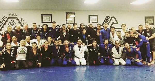 9 black belts on the mat for an open mat session. Tons of other upper belts in the photo as well.