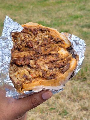 The  beef patty with coco bread and oxtail with peas and rice