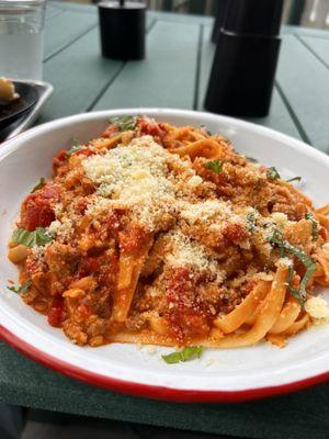 Vodka sauce with Italian sausage and pasta.