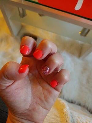 Bright orange/pink with sparkles.