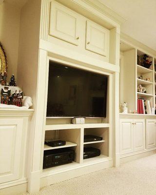 As an A/V contractor we work with master carpenters to modify/build built-in cabinets to meet your new TV & audio video home theater equip.