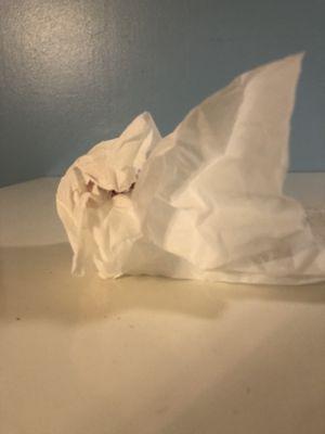 Bloody tissue from driver