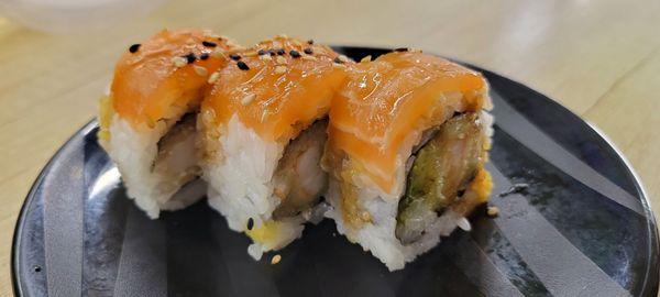 Didn't get the name - tempura shrimp, avacado, cucumber topped with salmon & sesame seeds - delicious