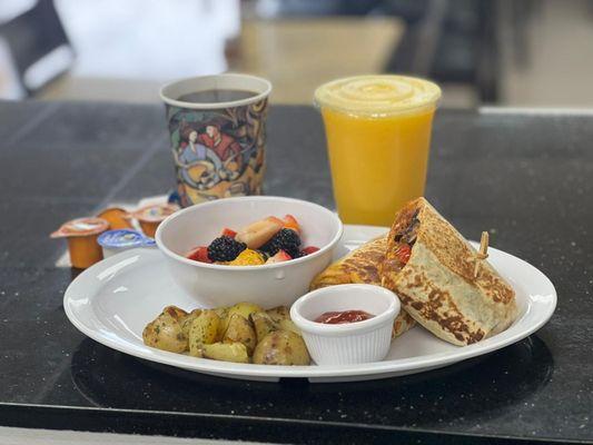 Breakfast Burrito with side of roasted potatoes and fresh  fruit