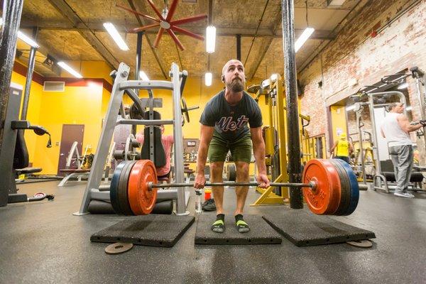 The variety of weights and machines at Mike's Fitness JP make it easy to perfect my deadlift form and increase my strength.