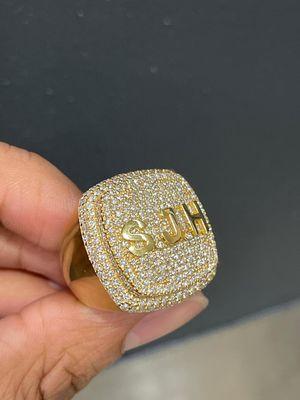 14k solid yellow with round brilliant cut VS G color grade diamonds..  made by Daniel Jewelry Inc located in Hialeah Florida.